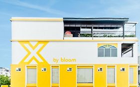 X By Bloom L Manyata